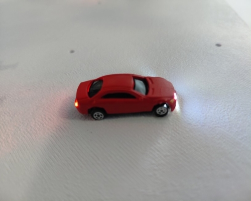 OO gauge model rail cars with working front and rear lights